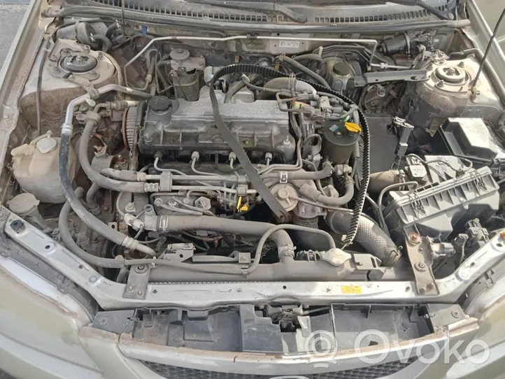 Mazda 323 Ilmastointilaitteen läpän käyttölaite/moottori (A/C) 