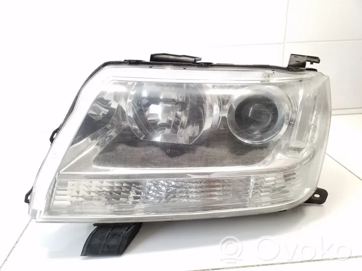 Suzuki Grand Vitara II Faro/fanale KOITO10059079