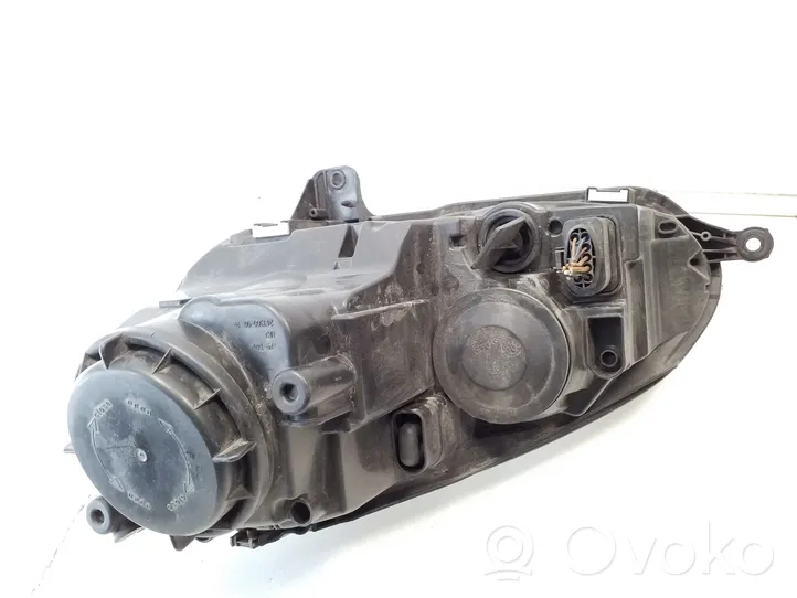 Volkswagen Golf V Lampa przednia 1K6941030P