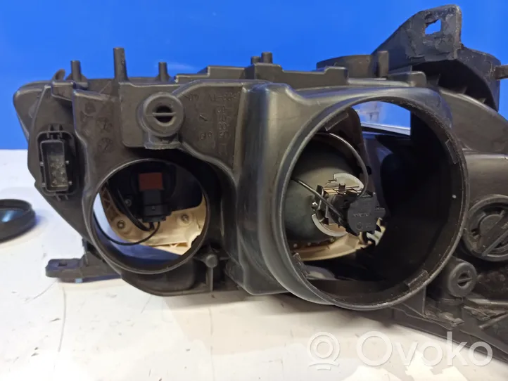 Saab 9-3 Ver2 Lampa przednia 12770137