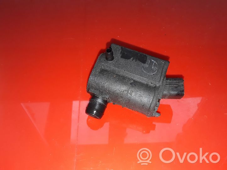 KIA Carens II Pompe de lave-glace de pare-brise 985103E000