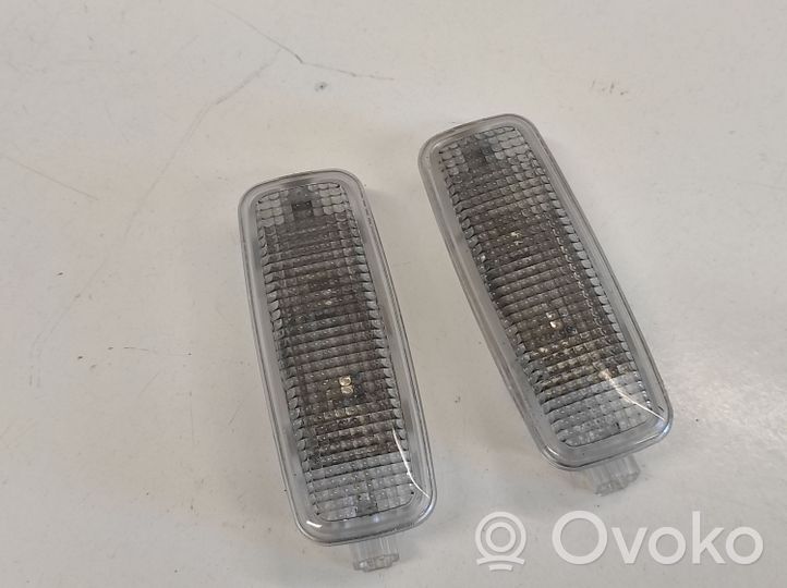 Audi A6 S6 C6 4F Lampa oświetlenia tylnej tablicy rejestracyjnej 4E0947105