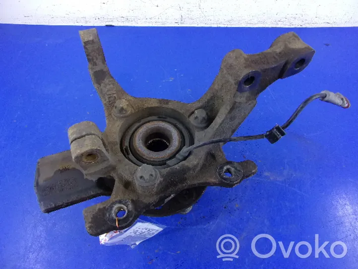 Opel Astra H Zwrotnica koła przedniego 13156047