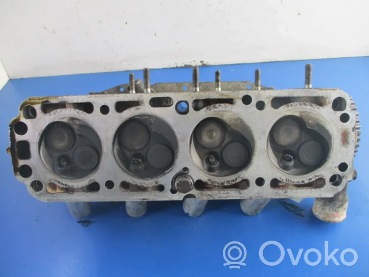 Opel Corsa B Engine head 90400110