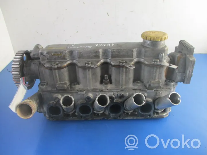 Opel Corsa B Engine head 90400110