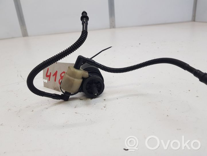 Volkswagen Golf IV Headlight washer pump 