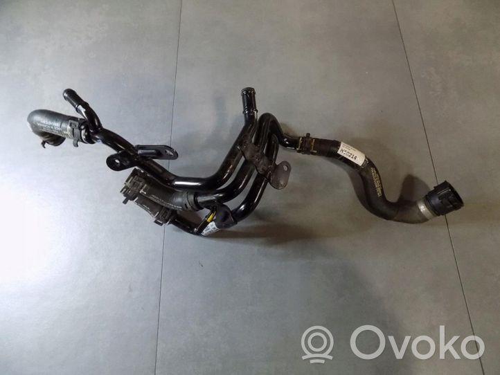 Volkswagen Caddy Tubo flessibile del liquido di raffreddamento del motore 04L121064AE