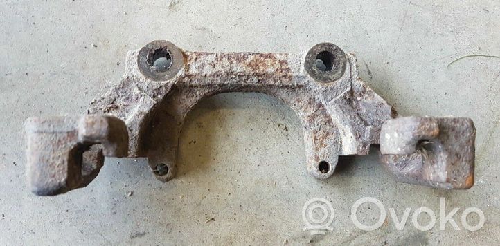 Volkswagen Golf III Plaquette / support d'étrier avant 3A0615125