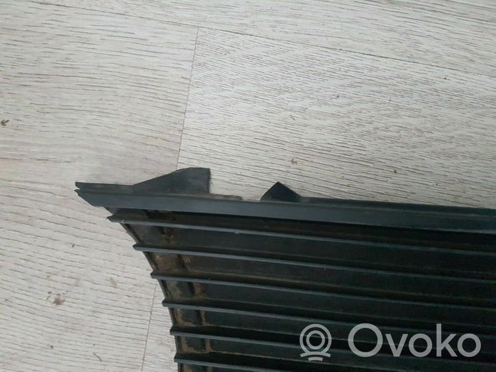 Volkswagen Golf I Front bumper upper radiator grill 171853653D