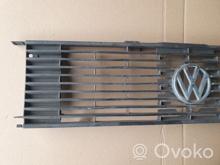 Volkswagen Jetta I Front bumper upper radiator grill 161853653