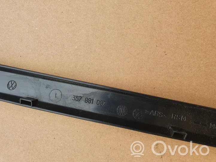 Volkswagen PASSAT B3 Rivestimento del binario sedile anteriore del conducente 357881087