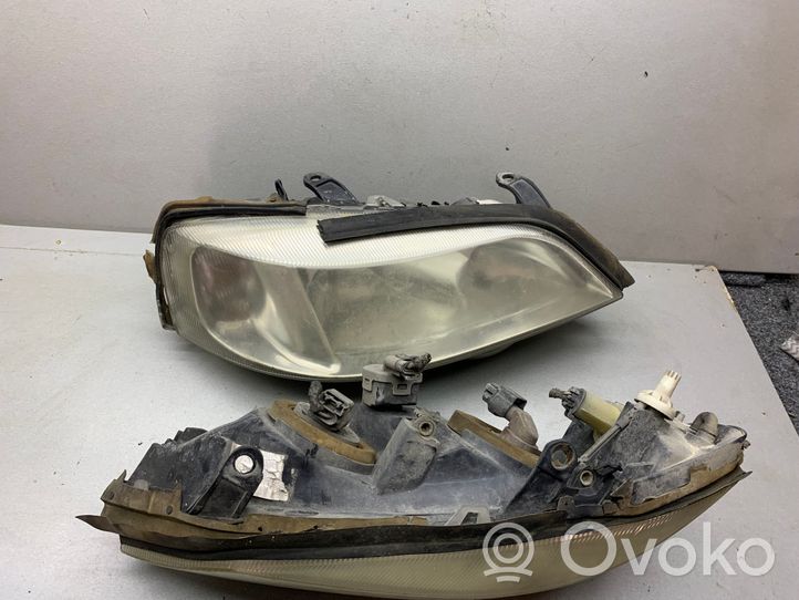 Opel Astra G Lampa przednia 90590665