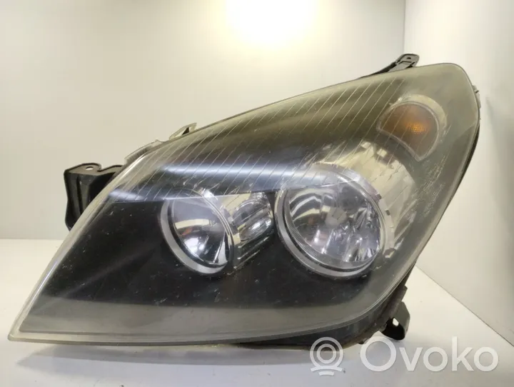 Opel Astra H Lampa przednia 1EG27037001