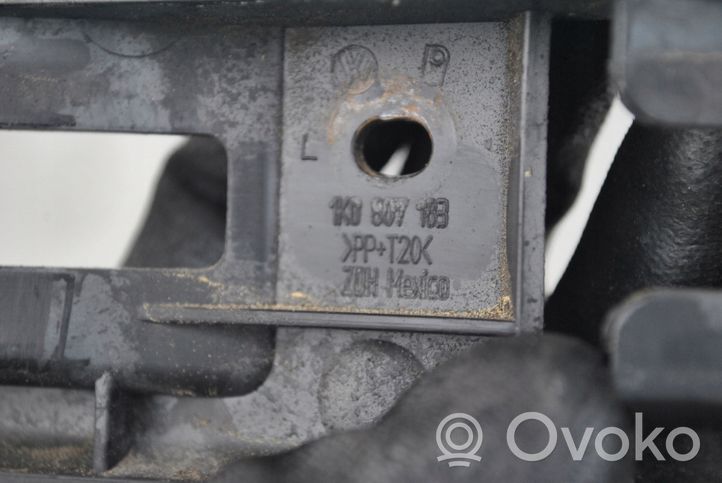 Volkswagen Golf V Uchwyt / Mocowanie błotnika przedniego 1K0807169