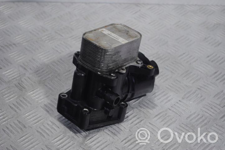 Volkswagen Polo V 6R Supporto di montaggio del filtro dell’olio 03P115389A