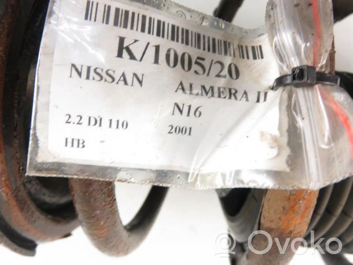 Nissan Almera N16 Amortiguador delantero con muelle espiral 