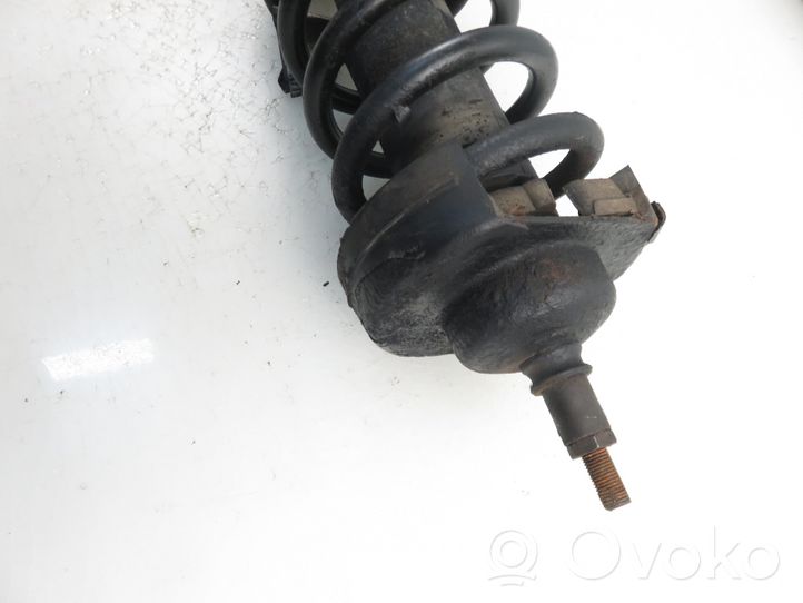 Opel Vivaro Front shock absorber with coil spring 