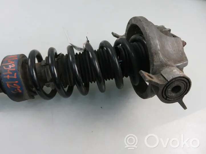 Volkswagen Touareg I Rear shock absorber with coil spring 7L6513029E