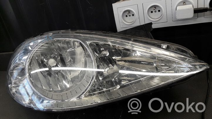 Mercedes-Benz A W169 Lampa przednia 0301197202