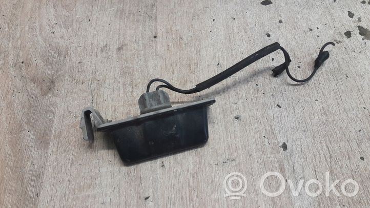 Mazda MX-3 Lampa oświetlenia tylnej tablicy rejestracyjnej 