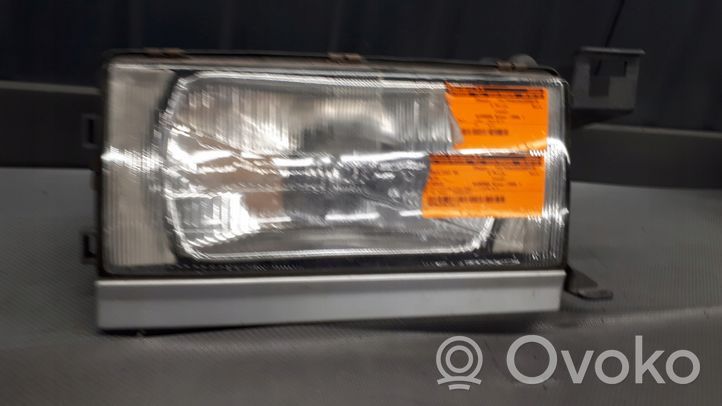 Volvo 740 Lampa przednia 1305239009