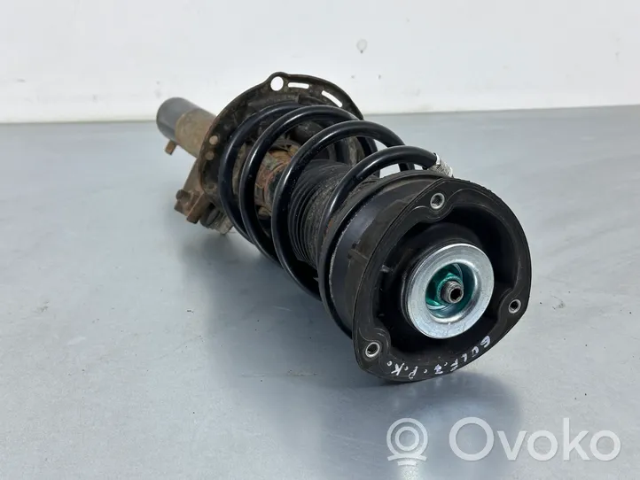 Volkswagen Golf VII Front shock absorber with coil spring 5Q0413023FK