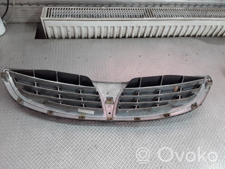 SsangYong Kyron Grille calandre supérieure de pare-chocs avant 7945109000