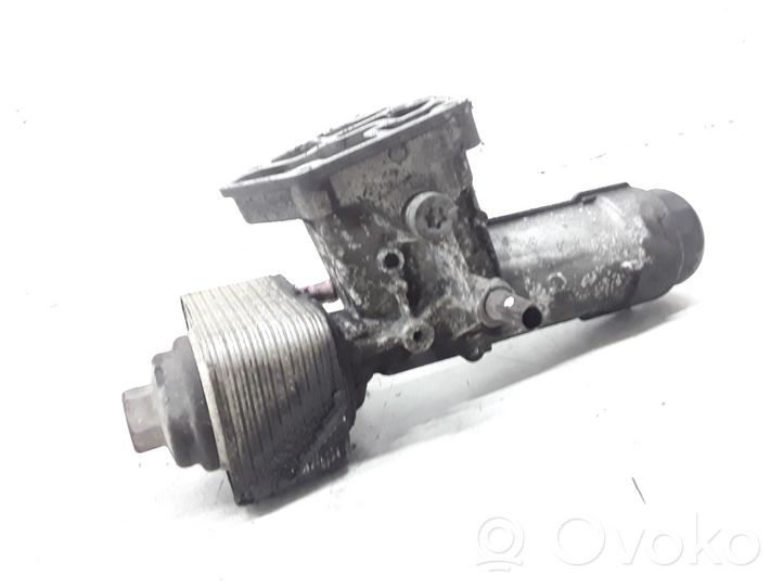 Volkswagen PASSAT B5 Supporto di montaggio del filtro dell’olio 038115389C