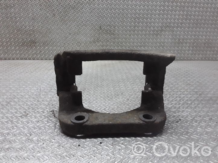 Renault Clio III Plaquette / support d'étrier avant 