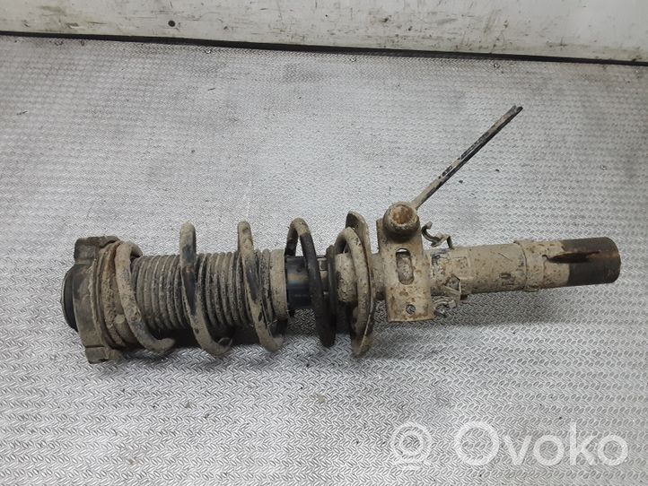 Volkswagen Polo IV 9N3 Front shock absorber with coil spring 