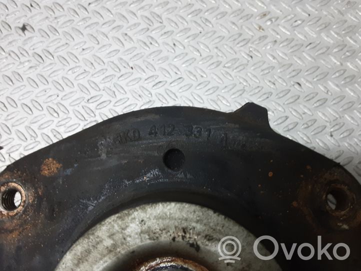 Volkswagen Caddy Supporto di montaggio della molla elicoidale 1KD412331A