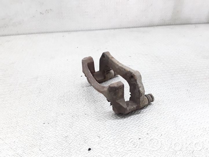 Mazda 2 Plaquette / support d'étrier avant 