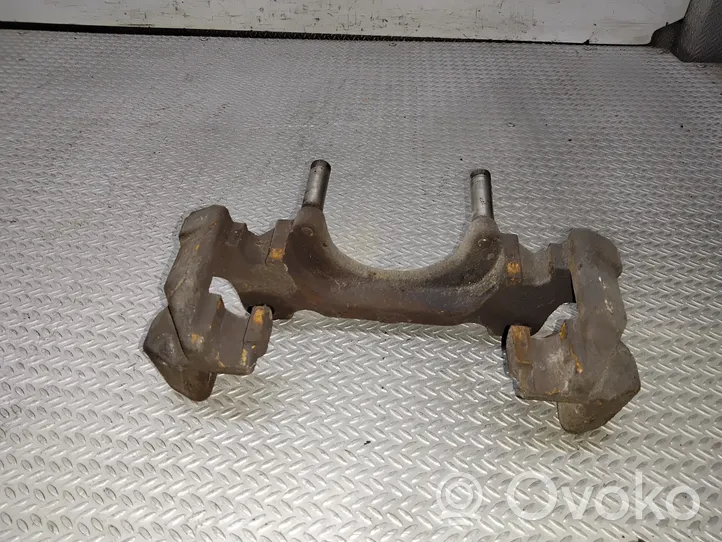 Volkswagen Golf V Plaquette / support d'étrier avant 