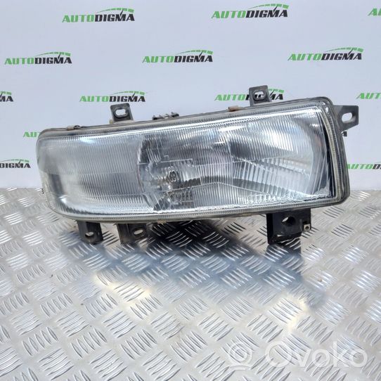 Renault Master II Lampa przednia 7701044519F