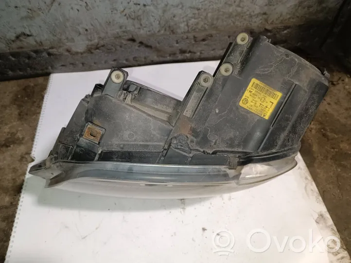 Volkswagen Touran I Lampa przednia 1305235777