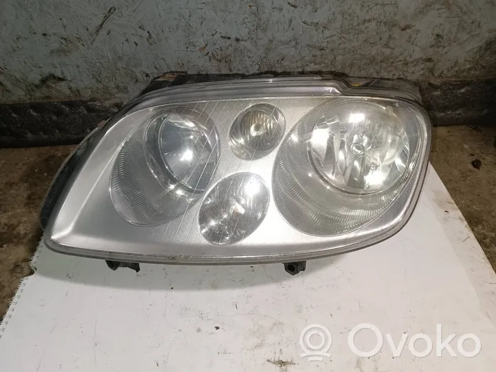 Volkswagen Touran I Lampa przednia 1305235777