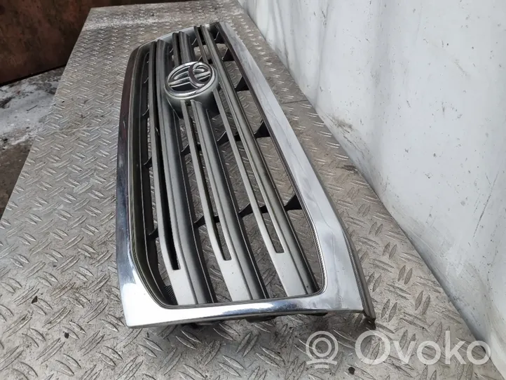 Toyota Land Cruiser (J100) Grille calandre supérieure de pare-chocs avant 5310160260