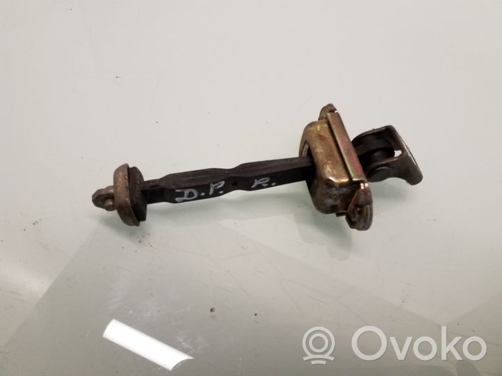 Nissan Primera Türfangband Türfeststeller Türstopper vorne 