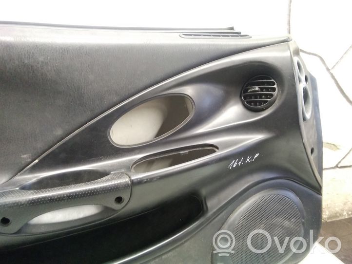Hyundai Coupe Front door card panel trim 