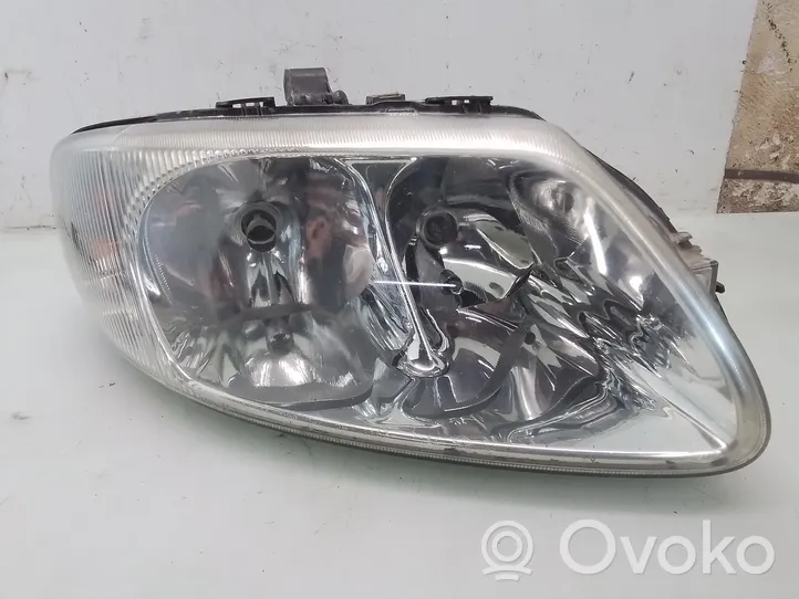 Chrysler Voyager Lampa przednia 04857701AB