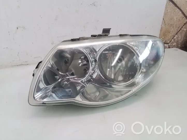 Chrysler Voyager Headlight/headlamp 04857831AC