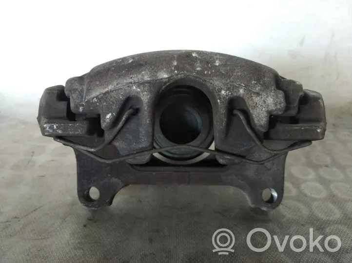 Volkswagen PASSAT Front brake caliper 581