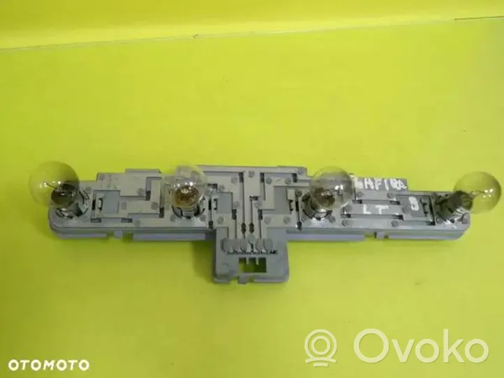 Opel Zafira B Cubierta del soporte de la lámpara de la luz trasera 7522-01