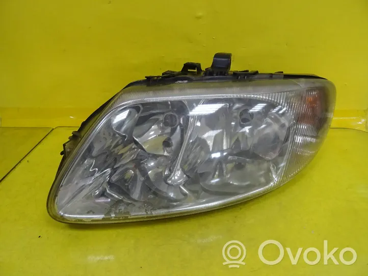 Chrysler Voyager Lampa przednia 04857703AB