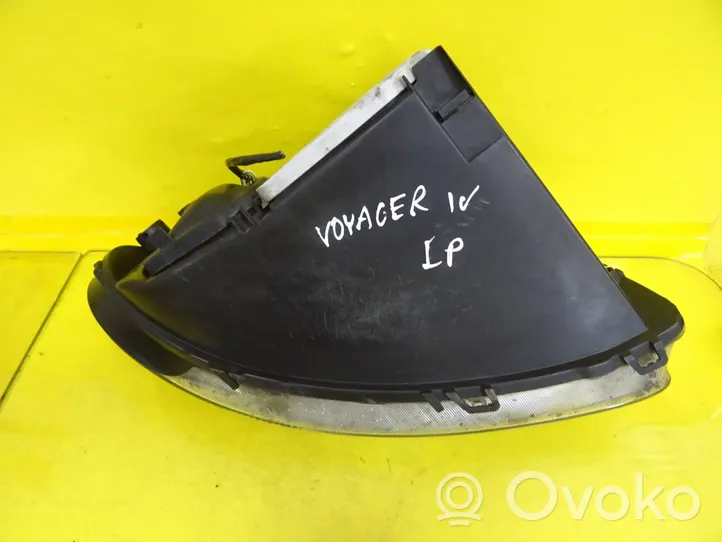 Chrysler Voyager Lampa przednia 04857703AB