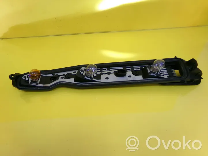 Opel Corsa C Takavalon polttimon suojan pidike VALEO