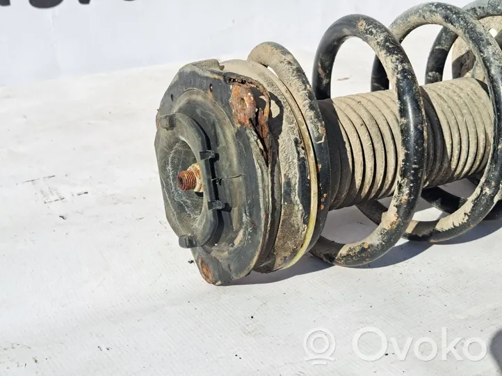 Nissan Qashqai Amortyzator osi przedniej ze sprężyną 54303JD73A