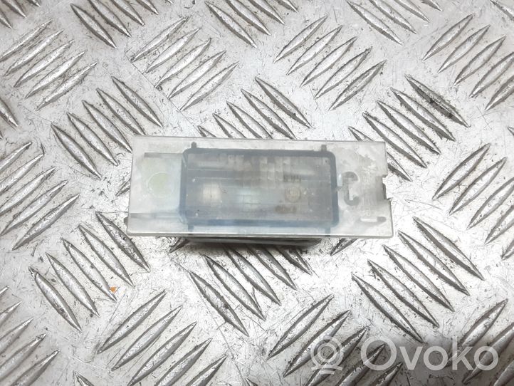 Renault Vel Satis Lampa oświetlenia tylnej tablicy rejestracyjnej 7700796163