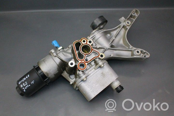 Volkswagen Jetta VI Supporto di montaggio del filtro dell’olio 06K117021B