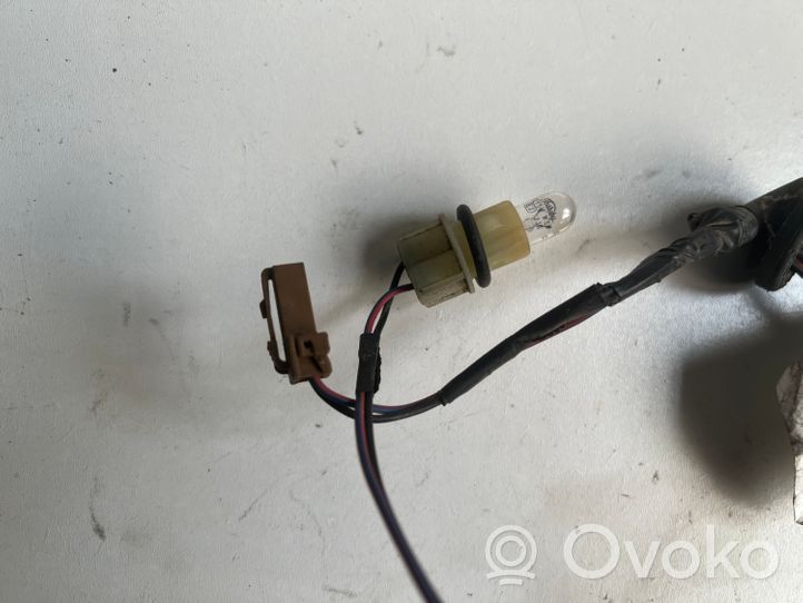 Nissan Almera Tino Lampa oświetlenia tylnej tablicy rejestracyjnej 24055BU700